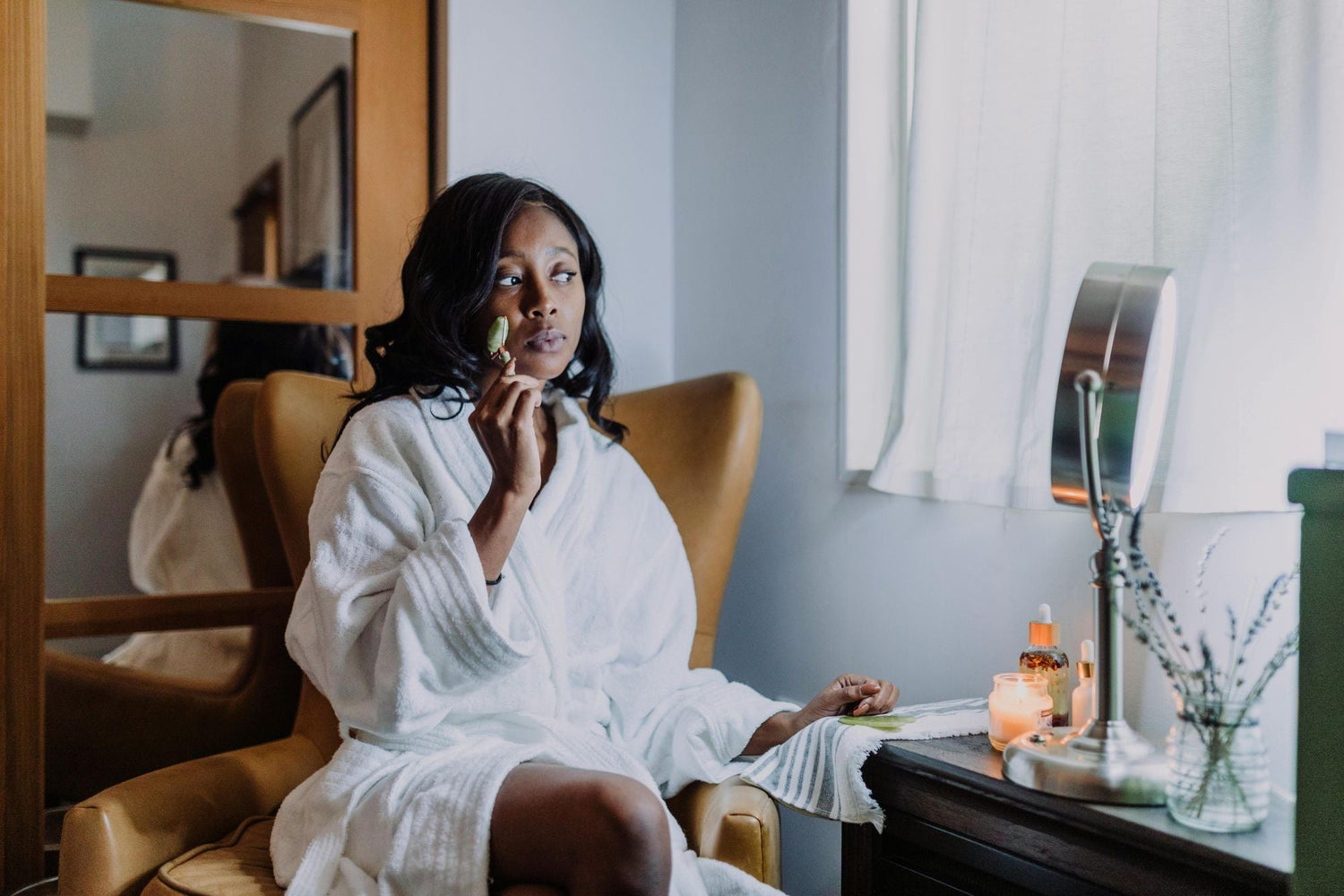 White towelling bathrobe made from terry cloth cotton.
