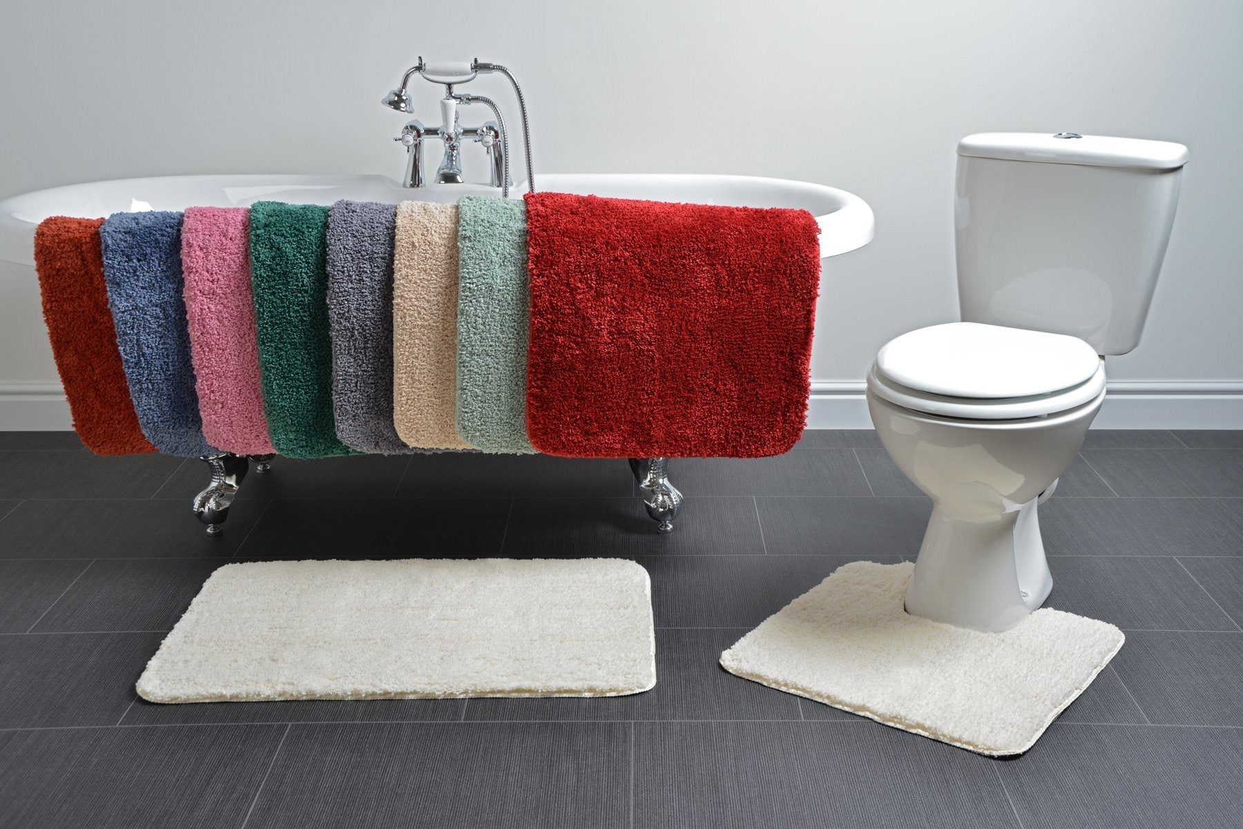 microfibre bath mats and pedestal mats on the side of a bath