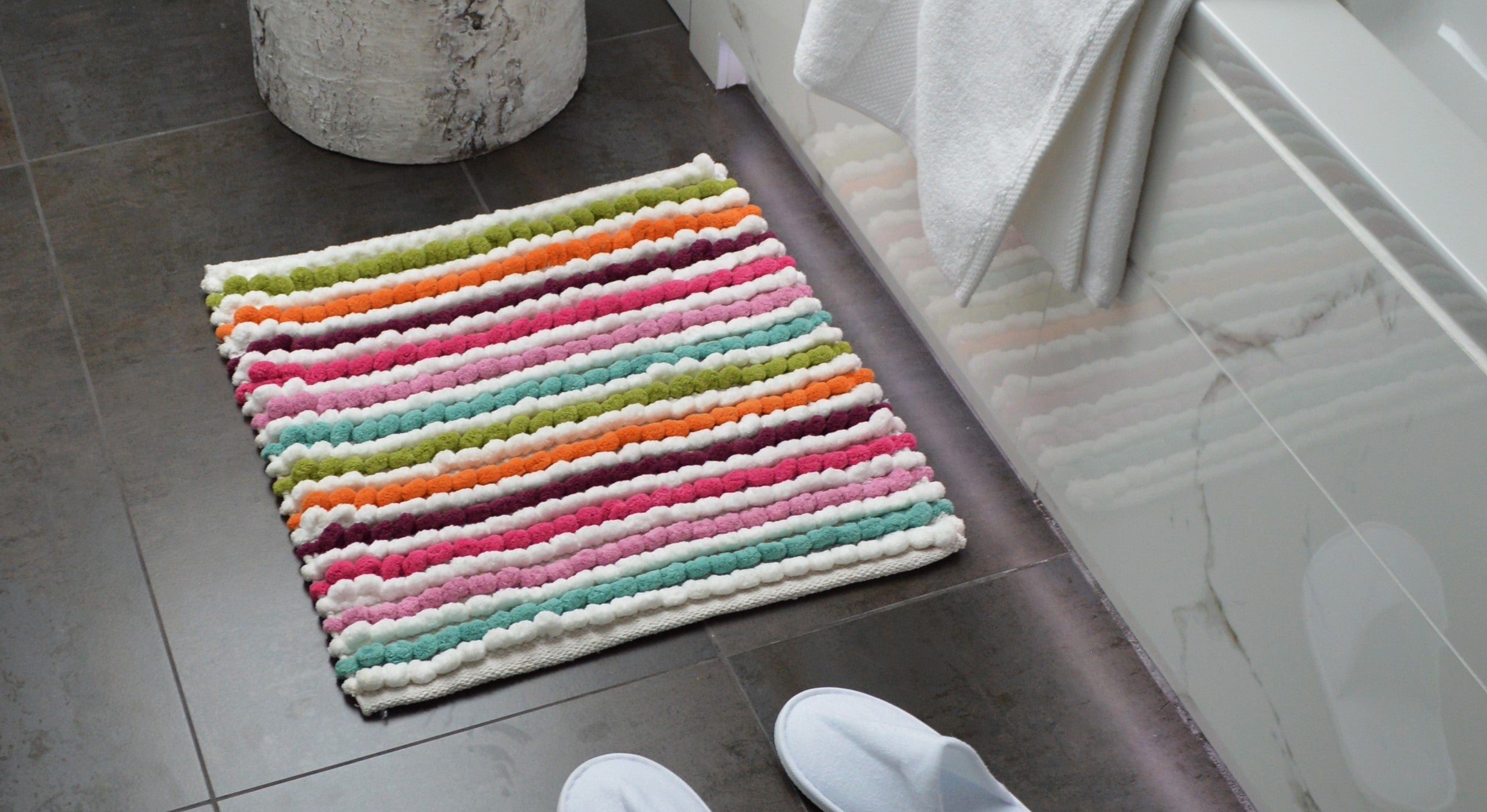 square bath mats for small bathrooms and shower units.