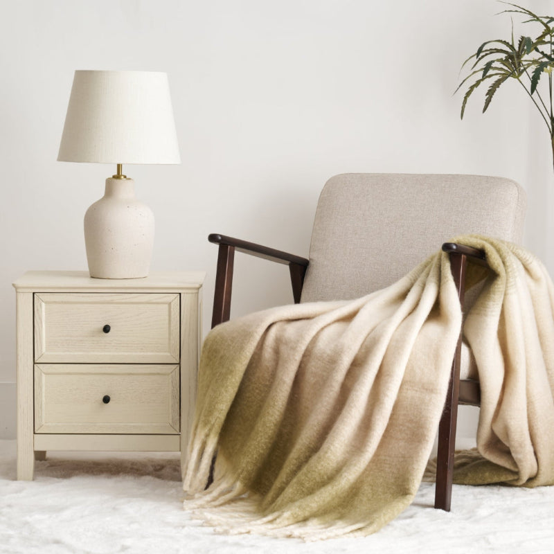 Cream and green faux mohair sofa throw blanket with fringe.