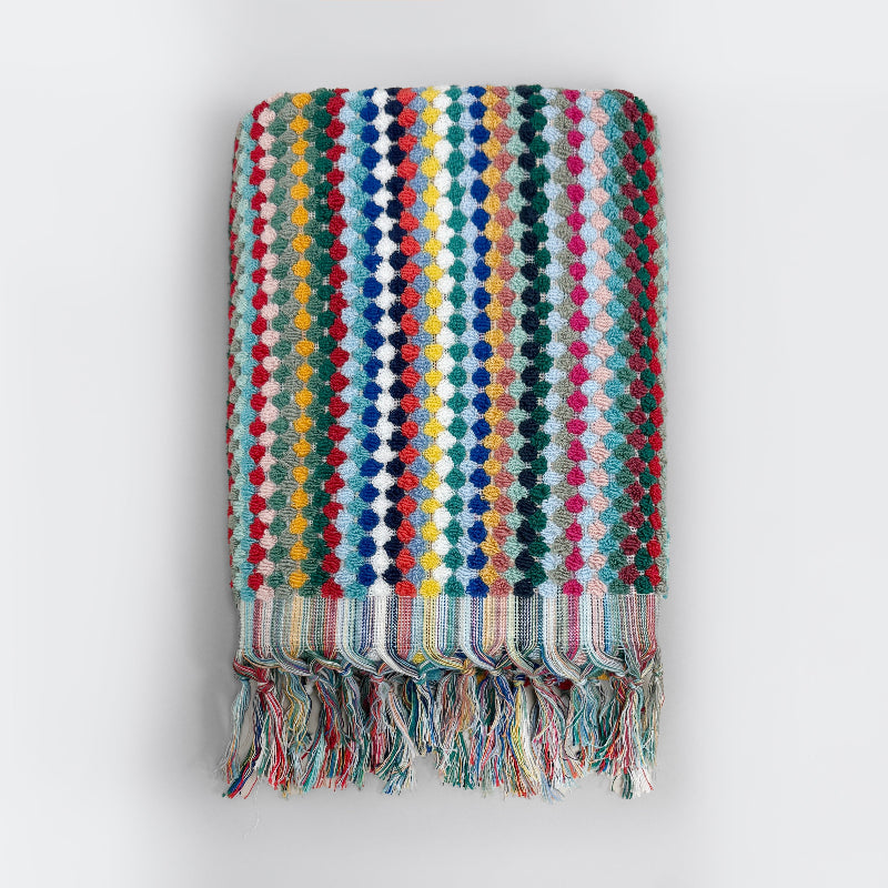 Striped colourful bath towel with textured bobble design and tasselled fringe.