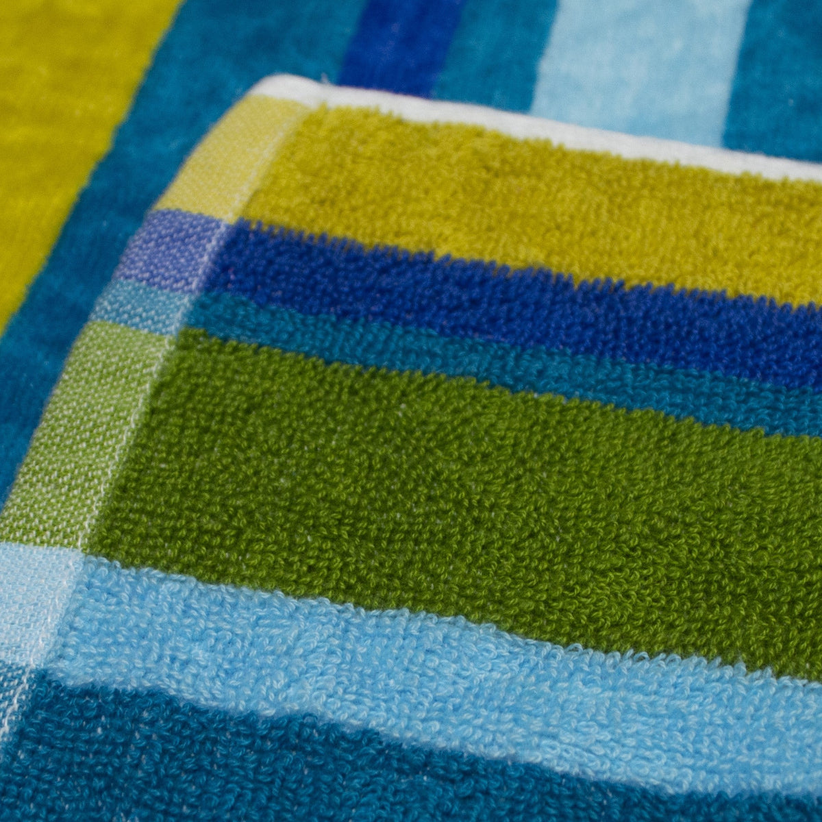 Blue and green striped beach towels.