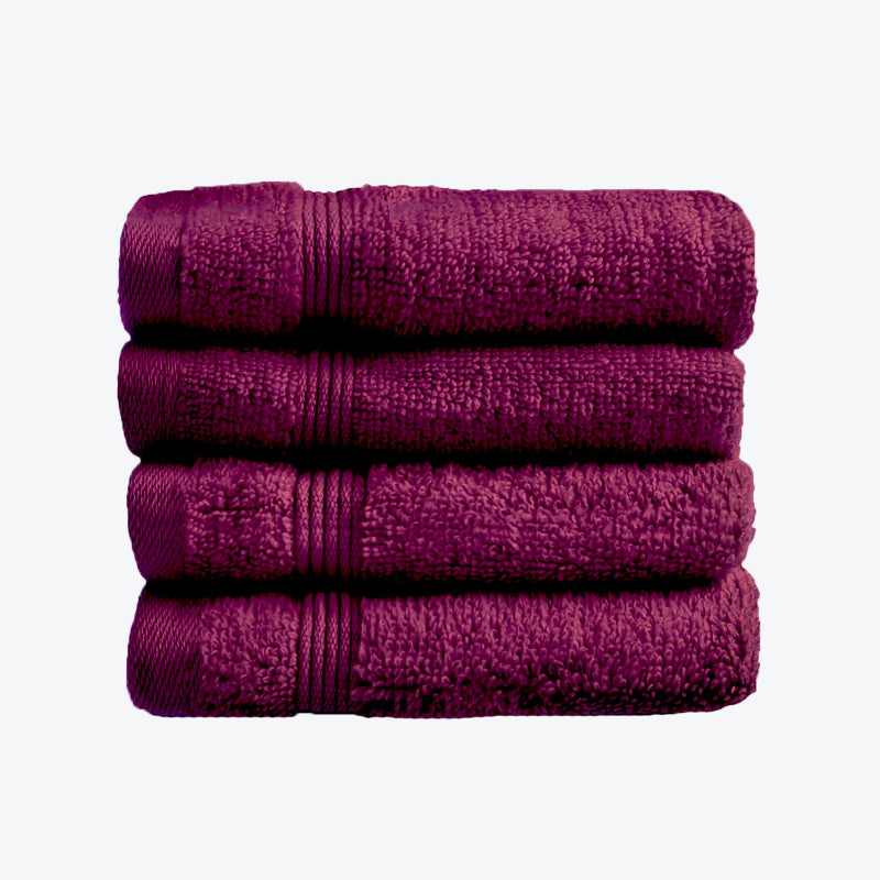 Beetroot Egyptian cotton towels and face cloths.