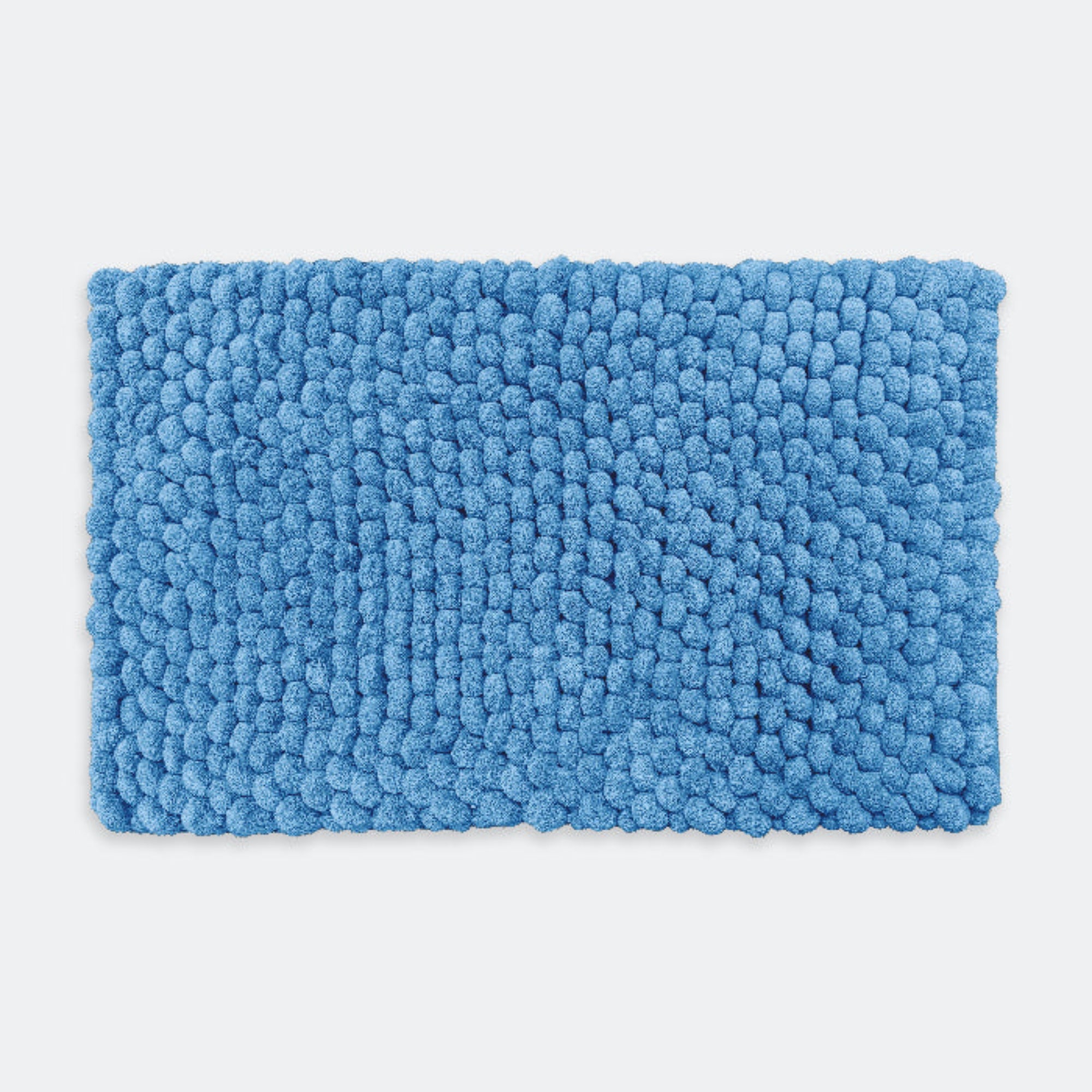 Blue chunky bobble bath mat, extra large and comfy.