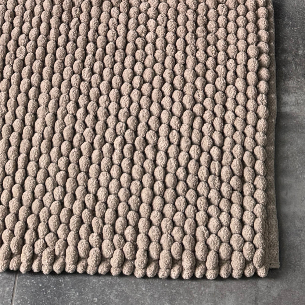 Thick bobble bath mat in brown neutral colour, for modern and contemporary style.