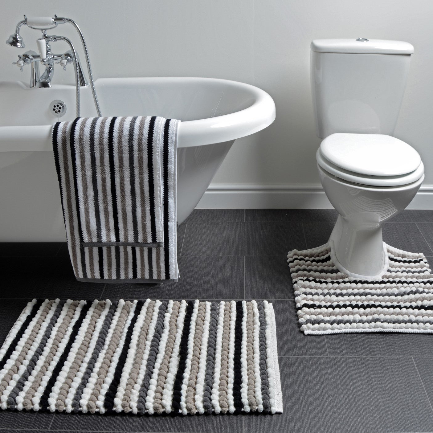 Monochrome bobble bath mat and pedestal mat.