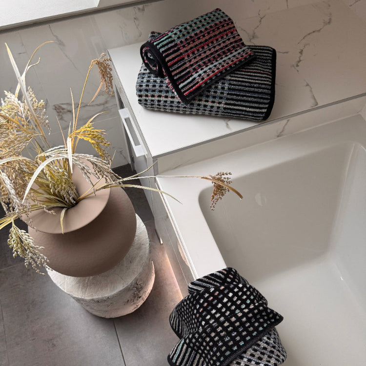 Patterned bath towels, hand towels, and bath sheets.