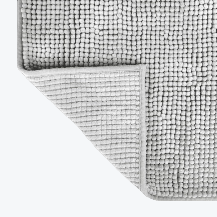 Non slip grey bath mats with chenille bobble pile.