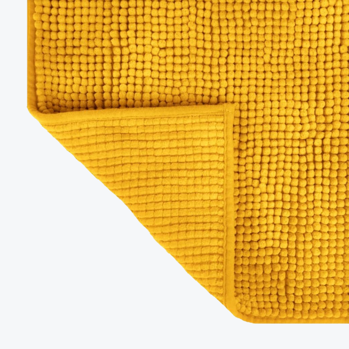Non slip bobble bath mat, mustard yellow.