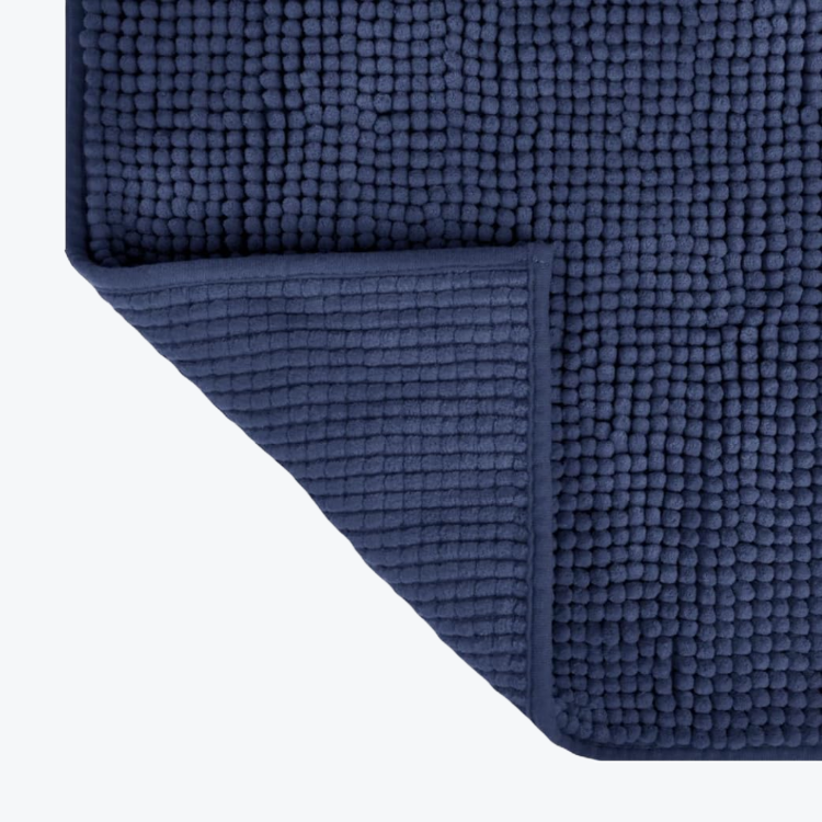 Navy blue chenille non slip bath mats.