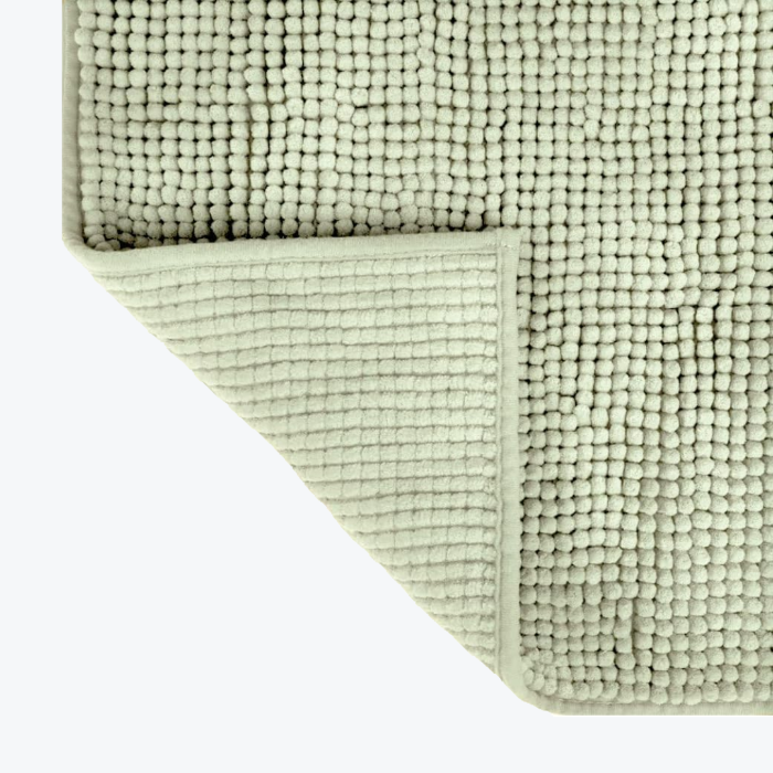 Non slip sage green chenille bobble bath mat.