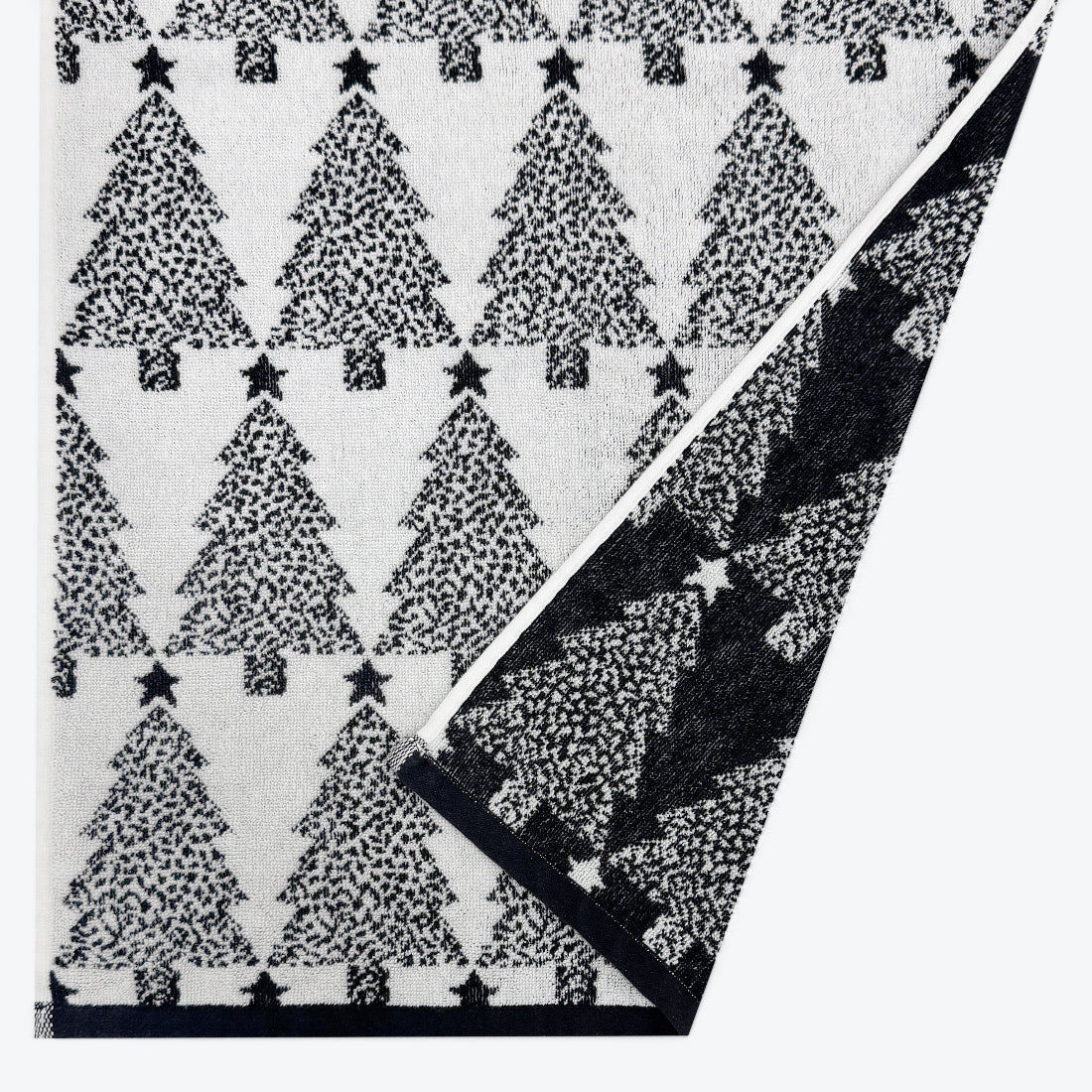 Christmas tree hand towels for the bathroom or kitchen. Fun, festive Christmas towels in black and white.