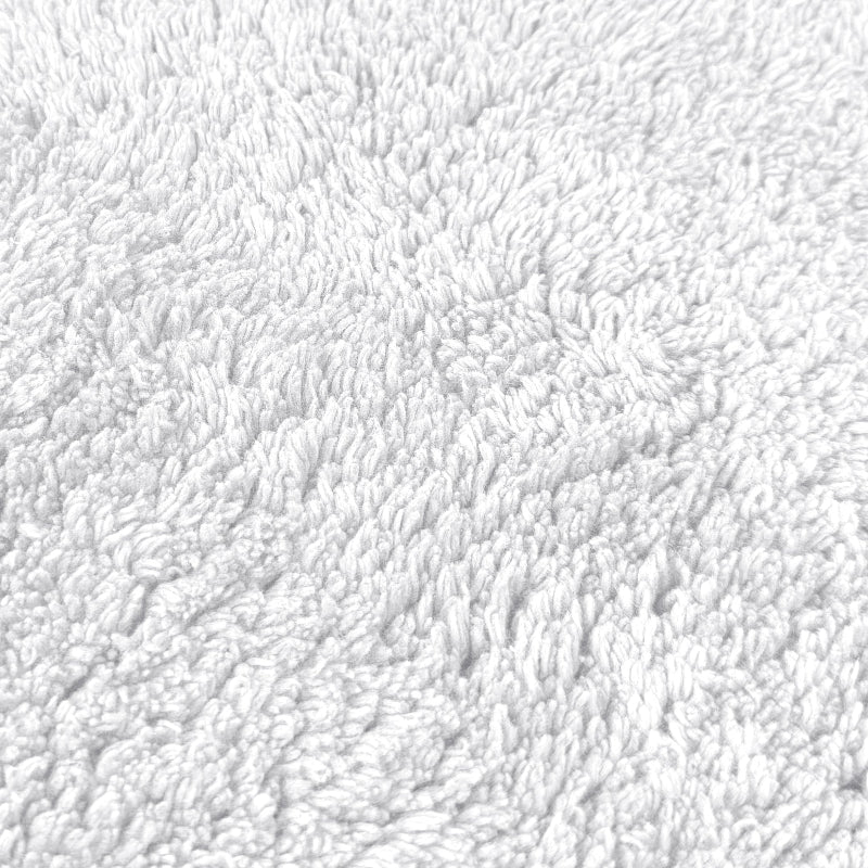 White cotton bath mat.