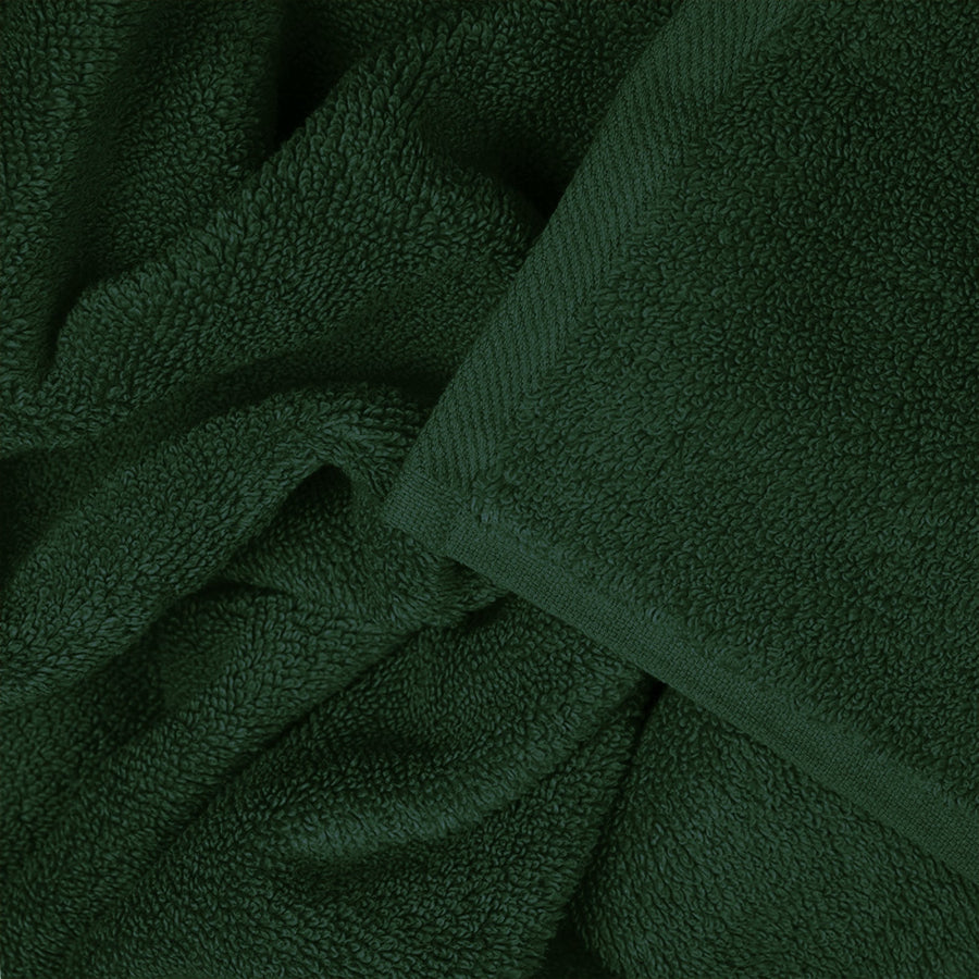 Dark green bathroom towels made from super soft Egyptian cotton terry cloth.