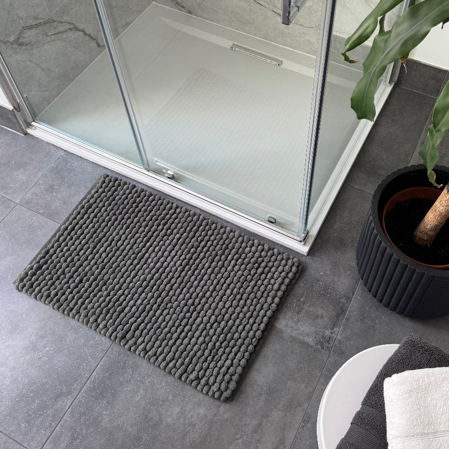 Charcoal grey bath mats with thick deep pile, handwoven large bobble for super softness and comfort.