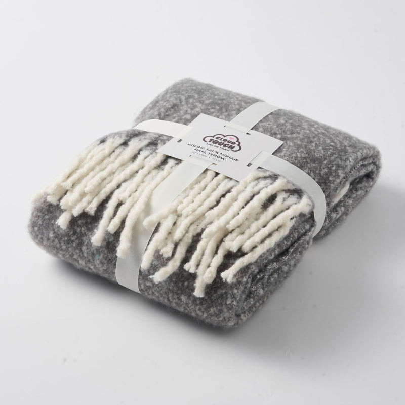 Faux mohair throw with fringe in graphite grey colour.