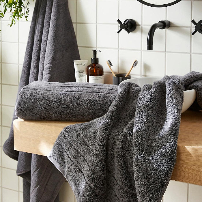 Charcoal grey hotel towels, premium heavyweight finish.
