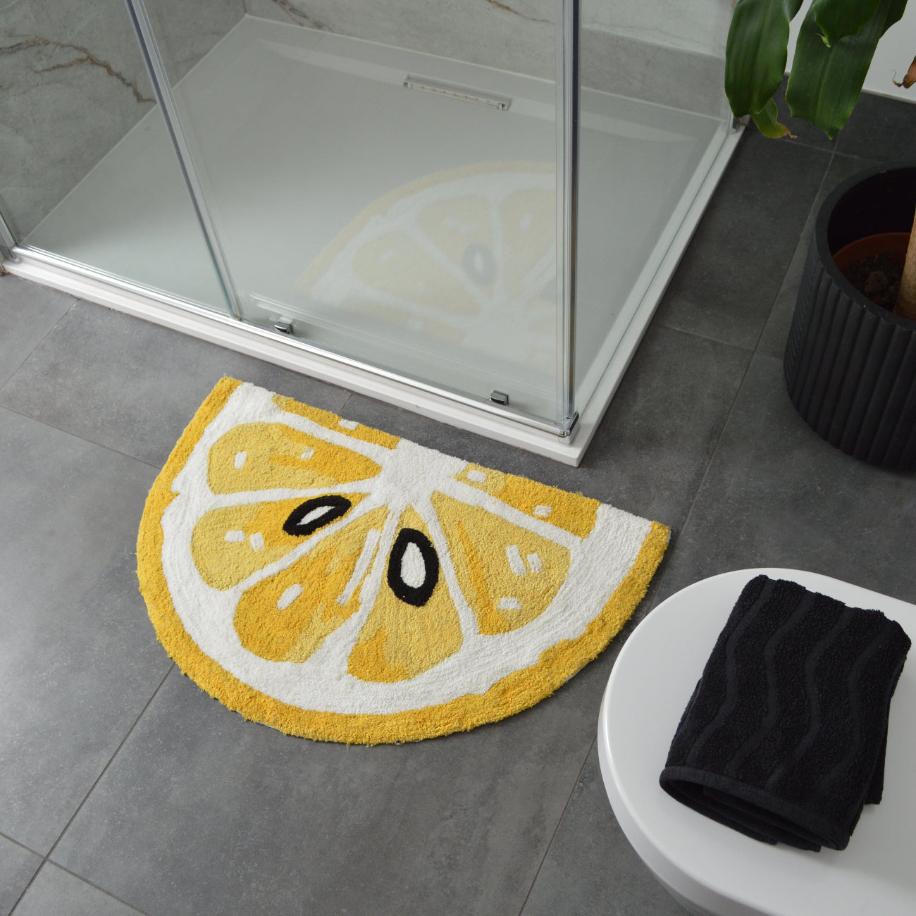 Yellow lemon slice bath rug, semi circle shape mat. Fun summer home decor.