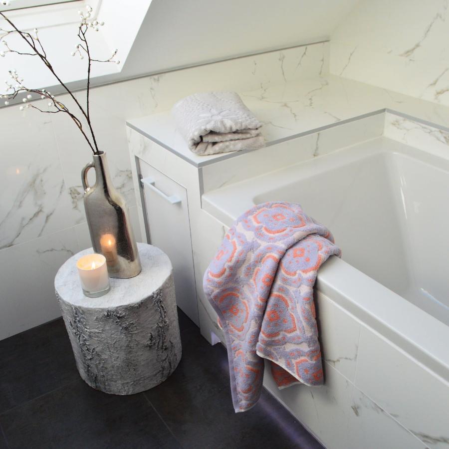 Lilac and coral Patterned towel - sculpted textured towels