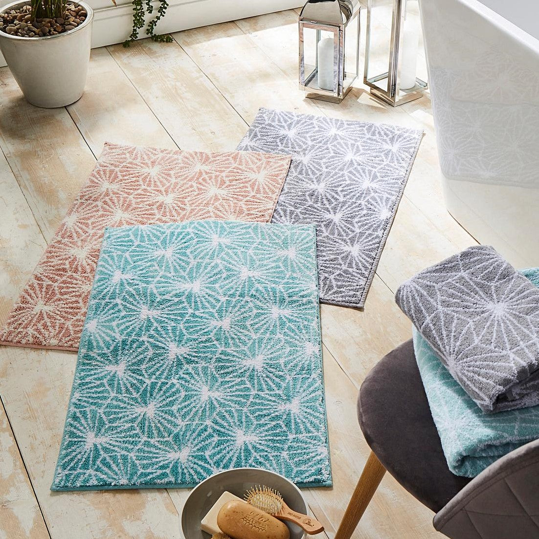 Patterned geometric bath mats.