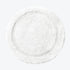 White cotton bath mat in round shape.
