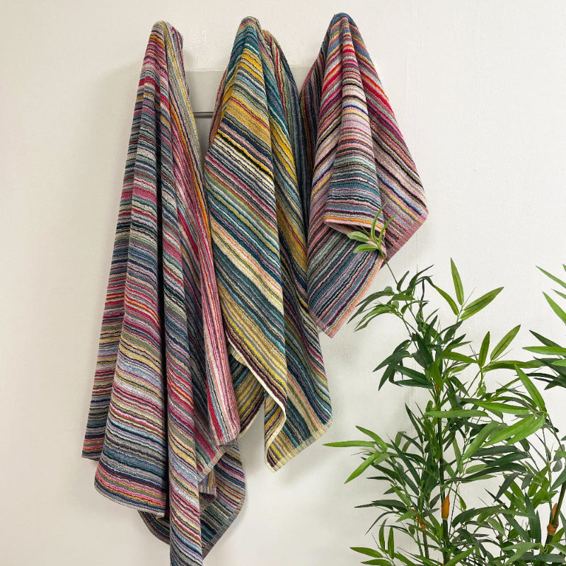 Striped colourful towels made from recycled cotton.