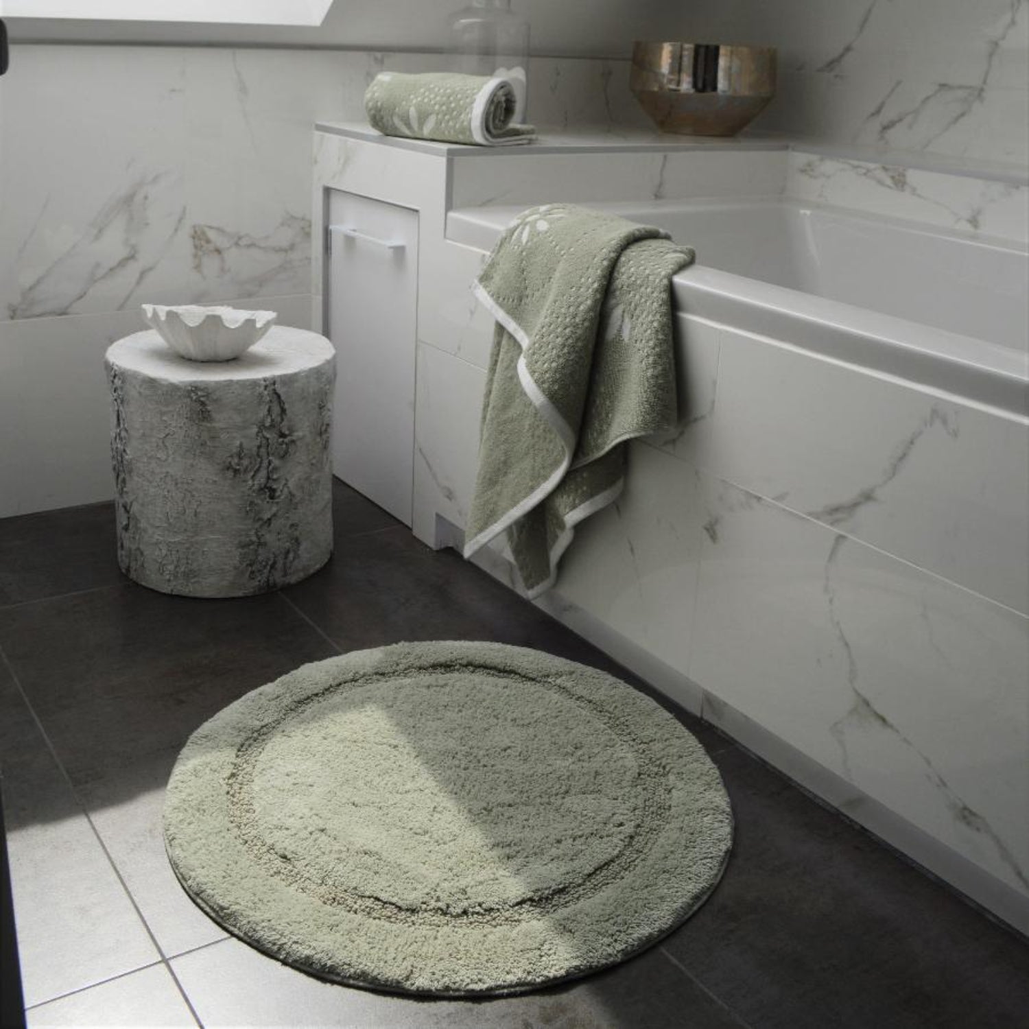 Sage green round bath mat -quirky circular shape.