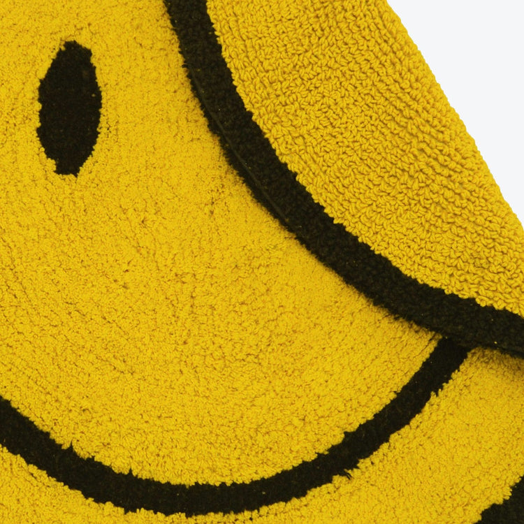 Yellow smiley face round rug for the bathroom or bedroom. Small accent rug.