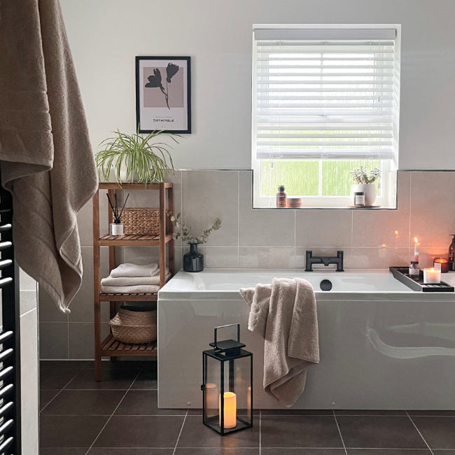 Quality thick hotel towels in beige.