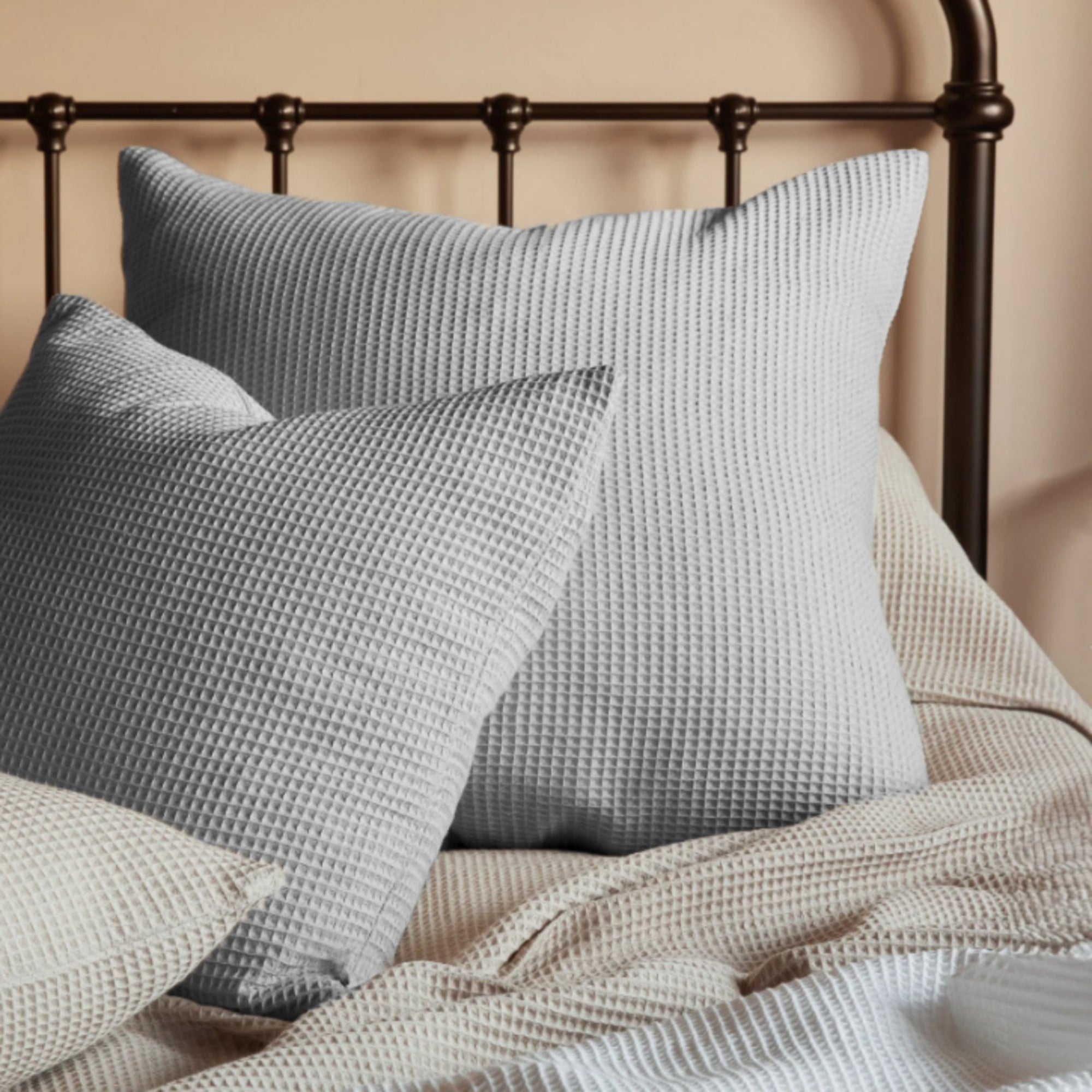 Light grey waffle cushion covers set.
