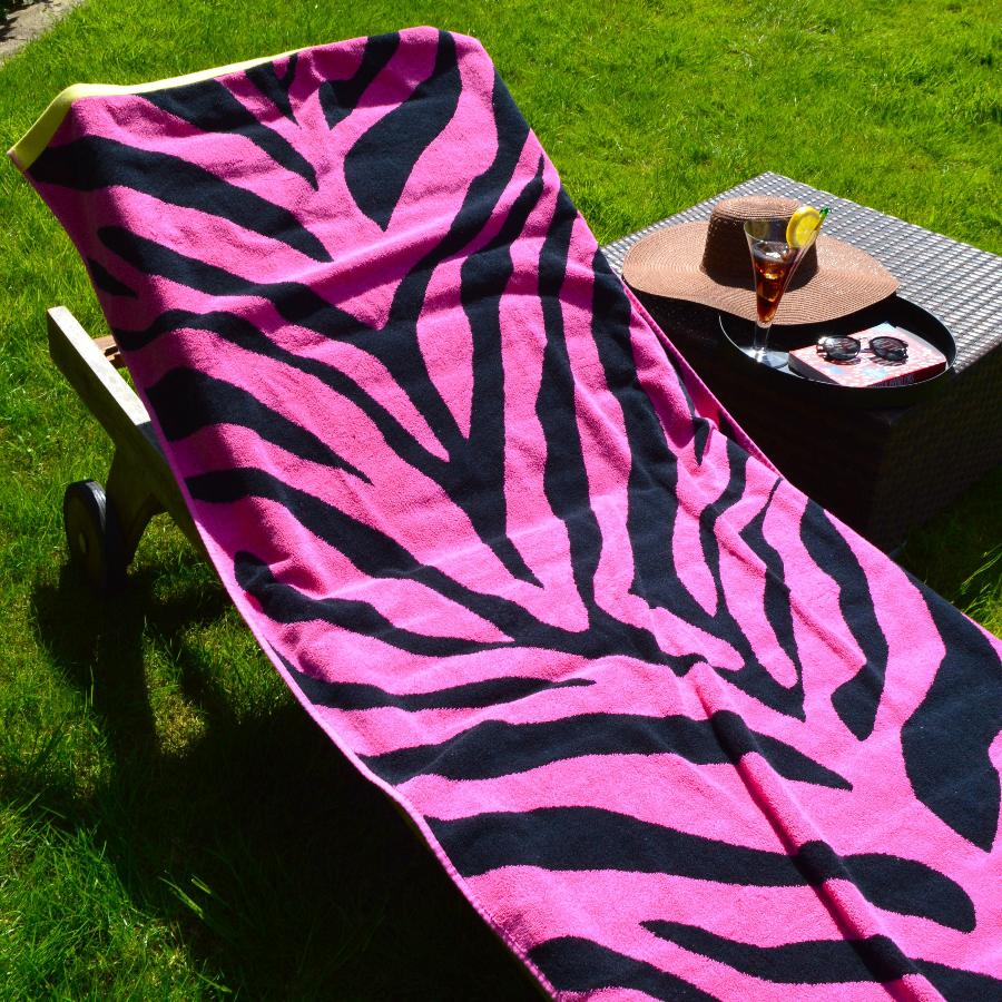 Bright pink ladies beach towel, animal print.