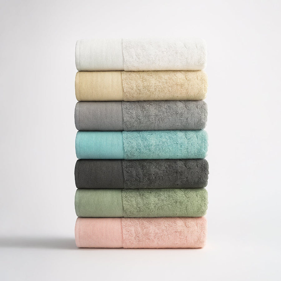 Bamboo bath towels and bath sheets - Stack of plain colour towels.