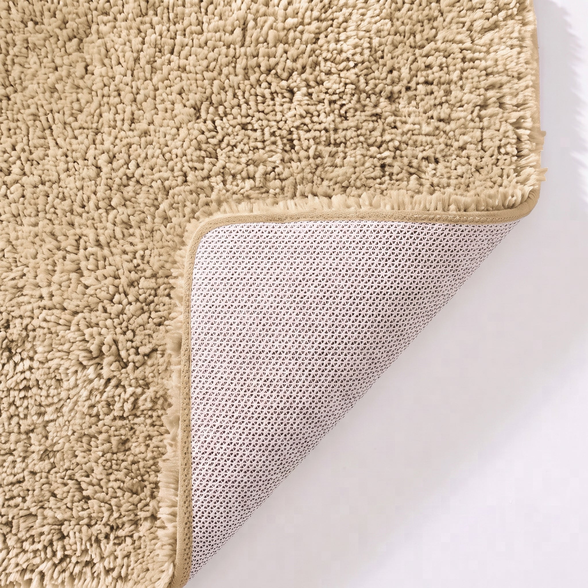 Neutral beige non slip toilet pedestal mat with shaggy pile- 100% microfibre.