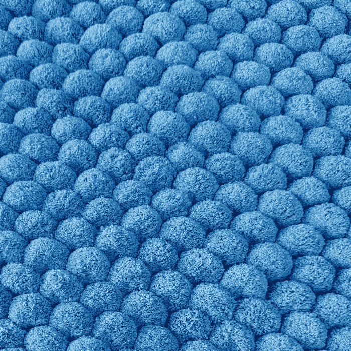Blue giant bobble bath mat with thick pile.
