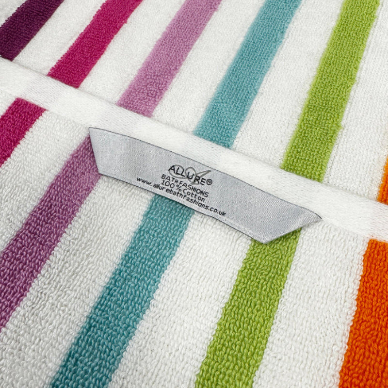 Fun towels with hanging loops in rainbow pattern.