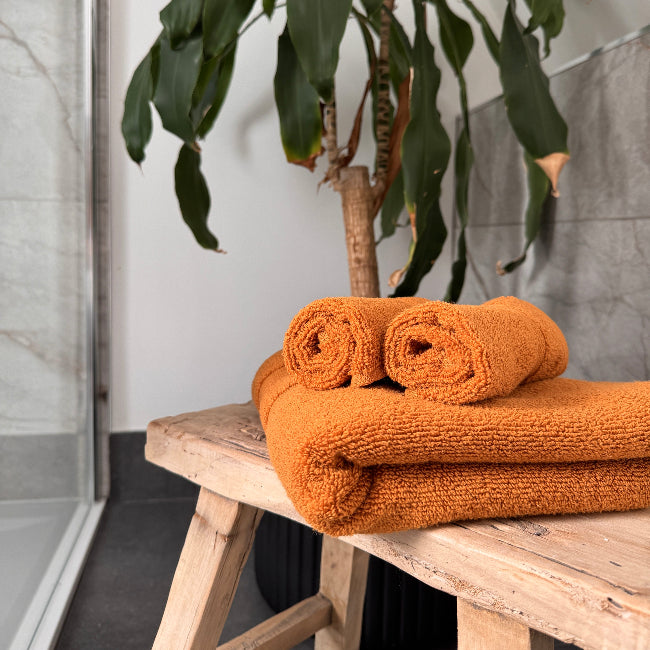 Orange towels made from Egyptian Cotton. Bath towels, hand towels, sheets and face cloths set.