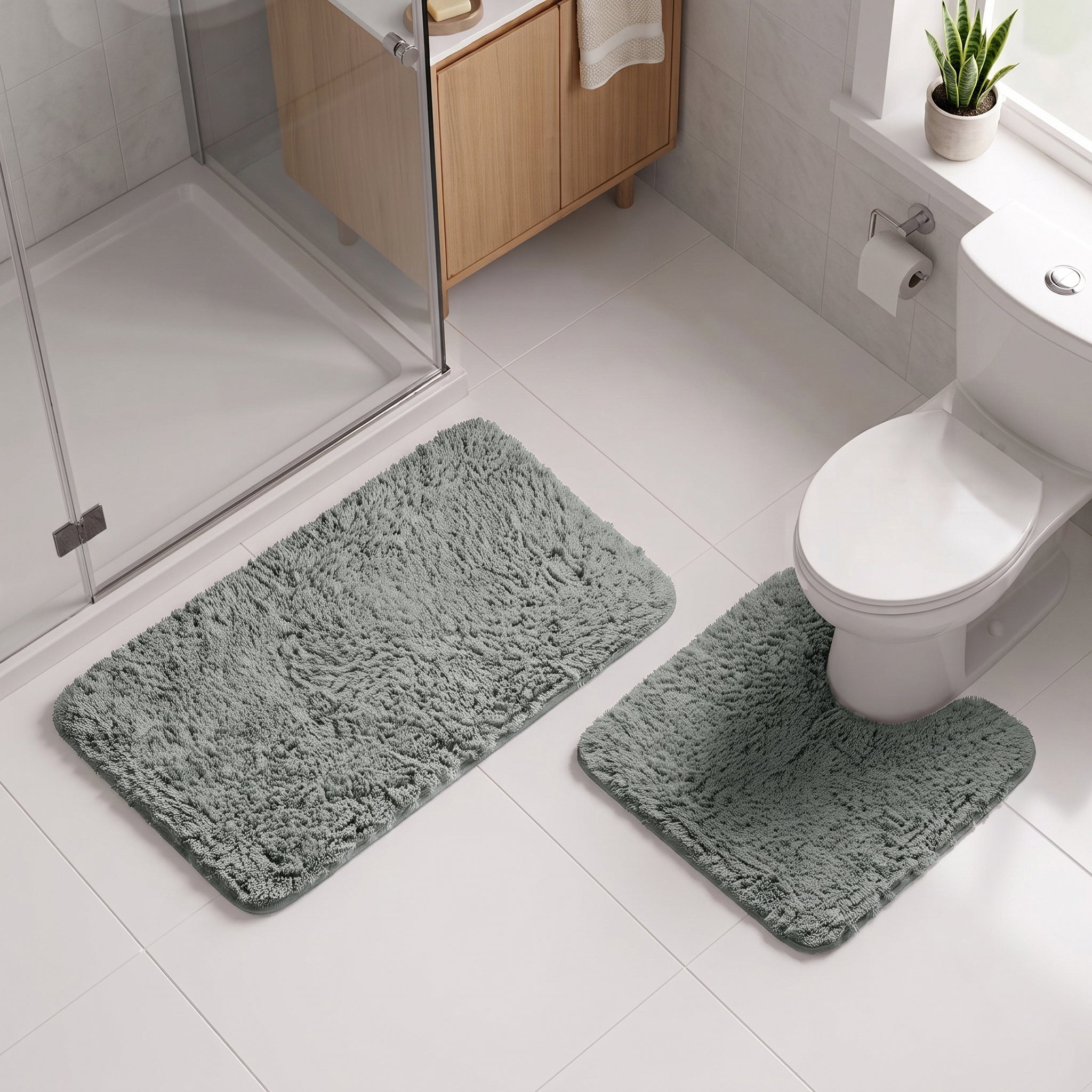 Charcoal grey 2pc set of bath mat and pedestal mat with non slip backing.
