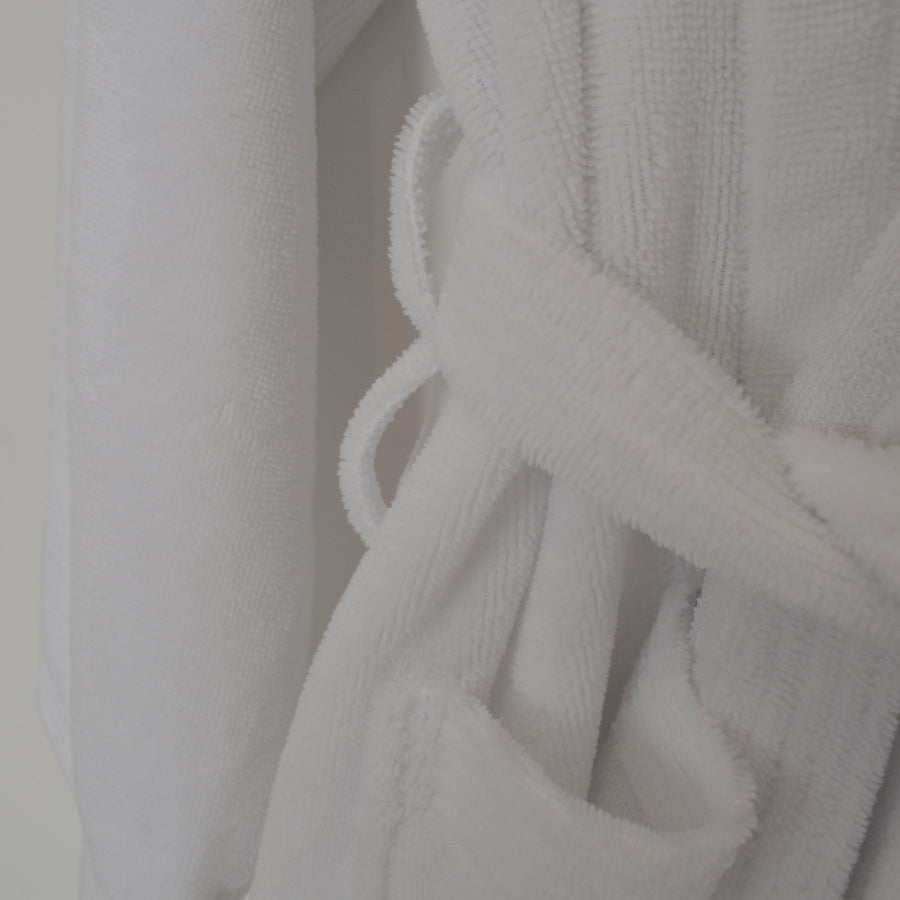 Super soft velour dressing gown in white with belt loops.