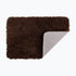 Brown non slip bath mat in small size.