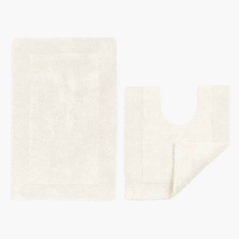 Cream bathroom mats 2pc set - bath mat and pedestal matching mats made from 100% cotton. Minimalistic reversible style.