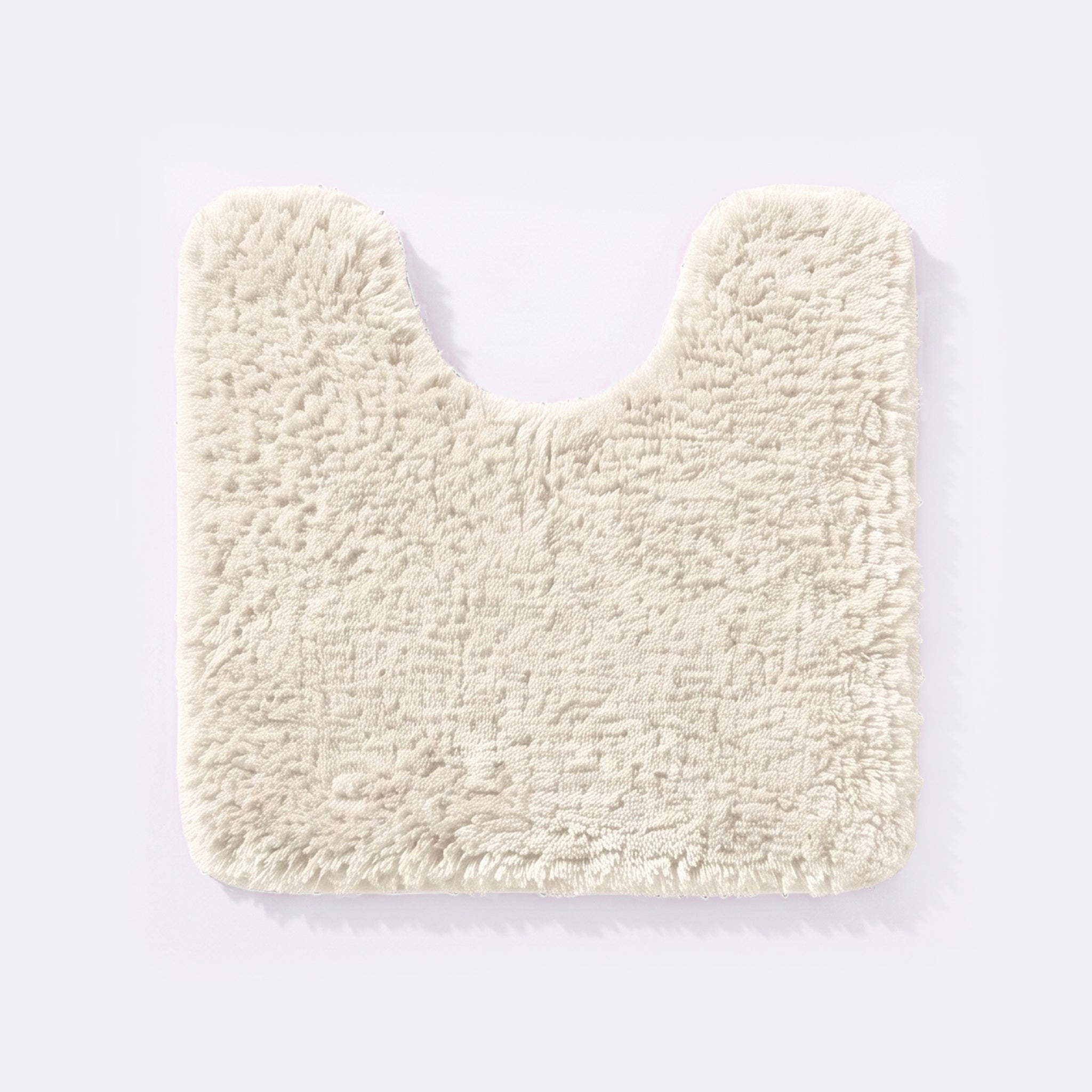 Cream non slip pedestal mat for the toilet or sink basin, plush shaggy microfibre pile.