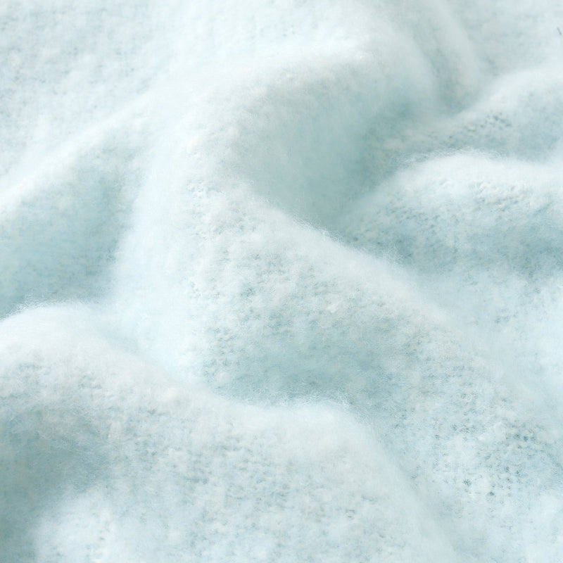Faux mohair blanket in duck egg blue - close up of soft texture.