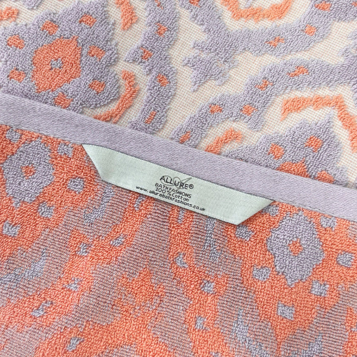 Patterned towels with hanging loops for quick drying and easy storage.