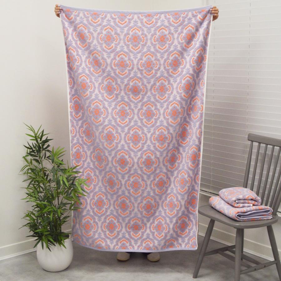 Patterned lilac and coral Ikat towels