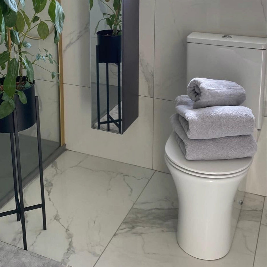 Grey hotel towels styled at home.