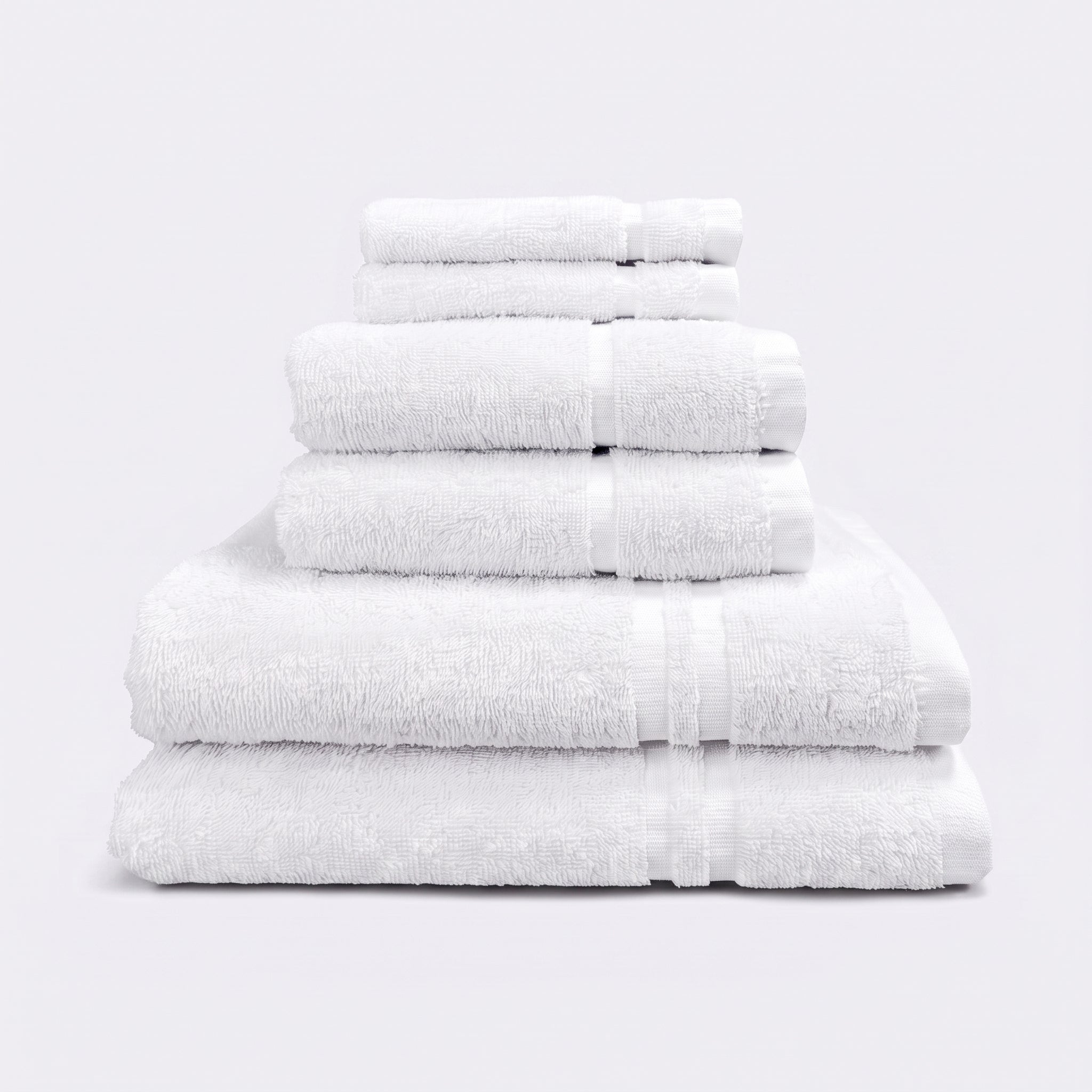 White set of 6 towels for the bathroom, face cloths, hand towels and bath sheet - bathroom essentials bundle.