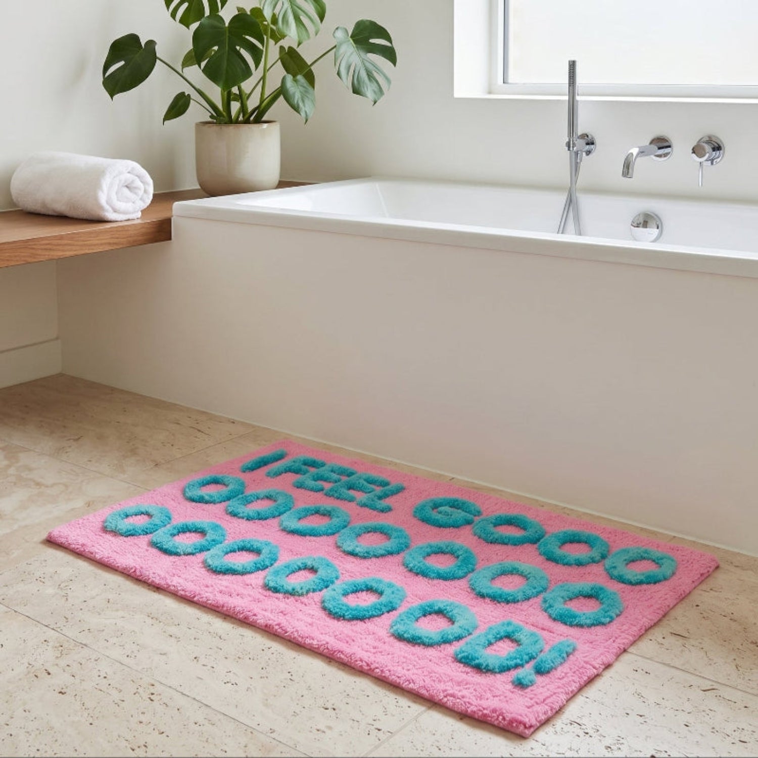 Pink bath mat with fun slogan. Hand tufted statement rug for bathroom.