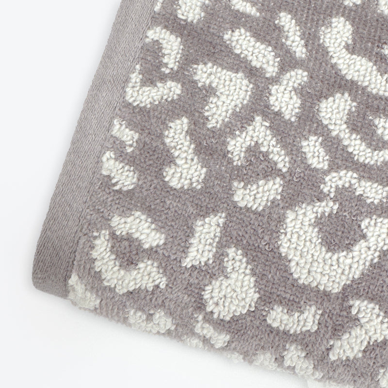 Grey and white leopard print towels with jacquard design. Super soft zero twist towels.
