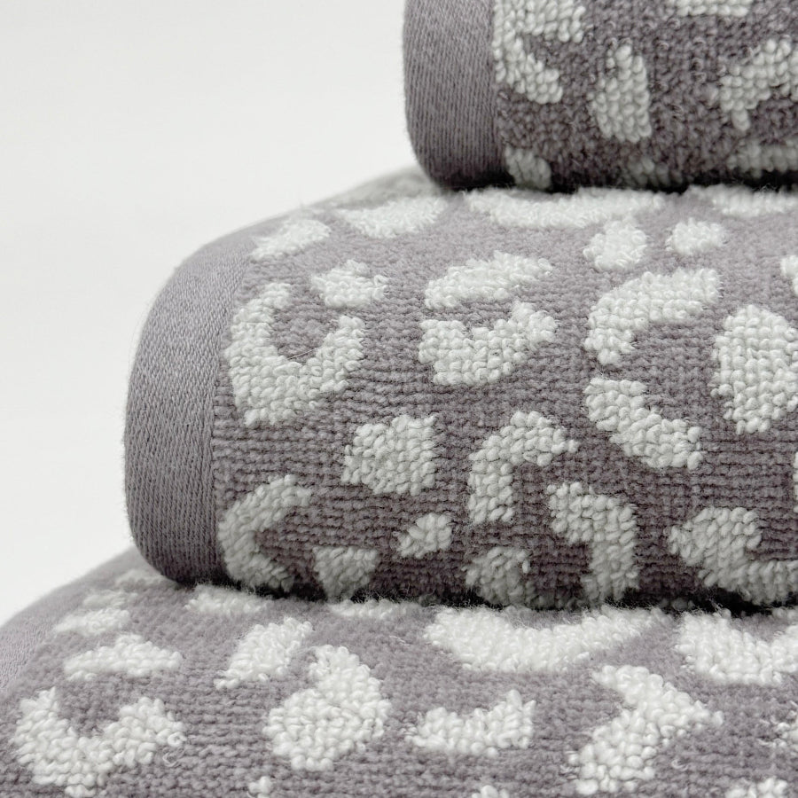 Grey and white leopard print towels for the bathroom - super soft jacquard design.
