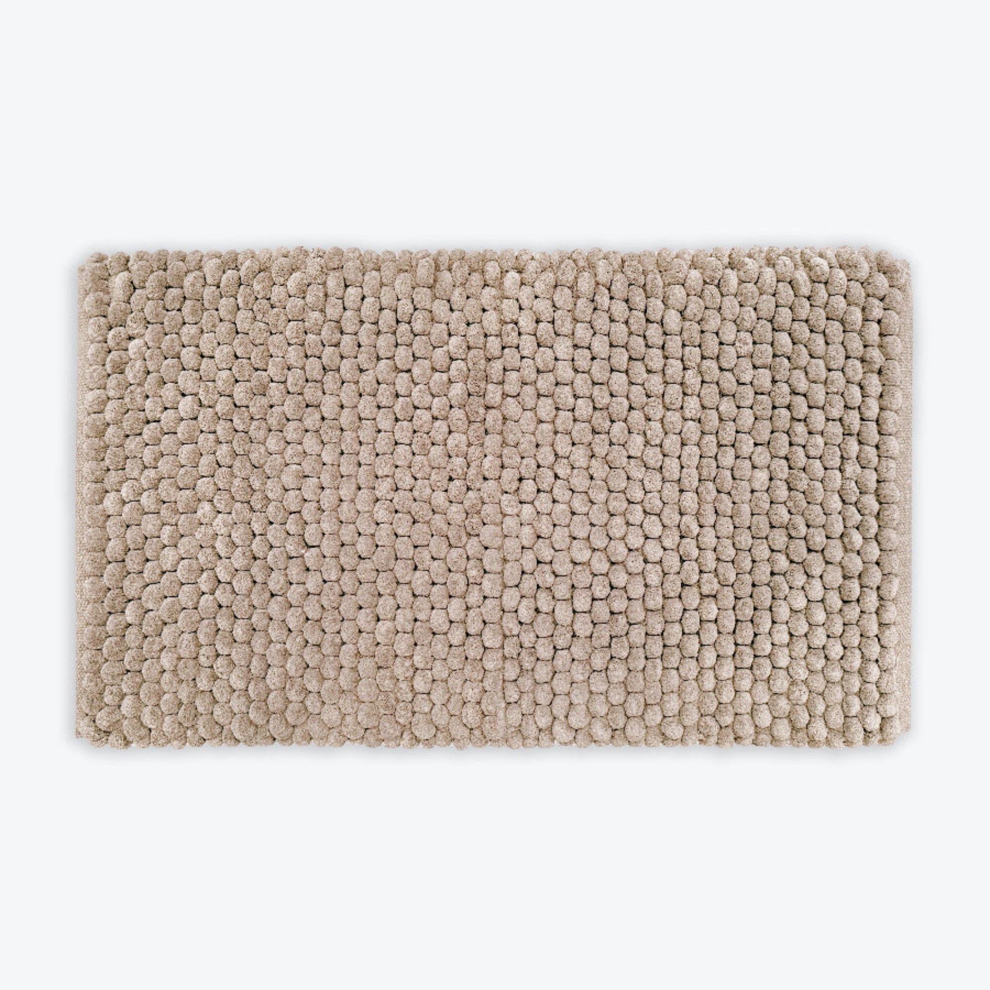 Neutral brown thick bath mat with luxury bobble texture. Super soft and absorbent washable rug.